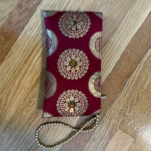 Embroidered wristlet. Perfect for 🎉parties!!